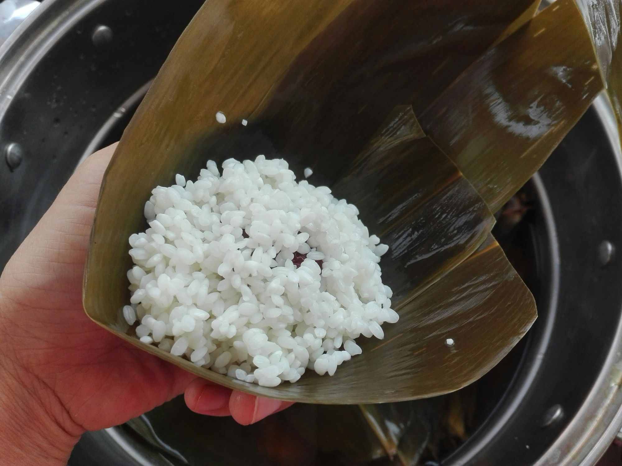 端午包粽子的过程怎么写